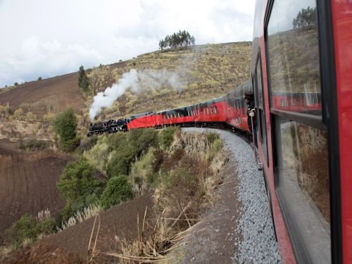 RIDE ECUADOR BY TRAIN, RAIL, RAILROAD & RAILWAY: The luxureous Crucero train reaching the Guayaquil lowlands after a breathtaking descent along the Andes slopes. 