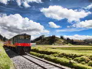 RIDE ECUADOR BY TRAIN, RAIL, RAILROAD & RAILWAY: A Diesel locomotive pulling the Crucero train.